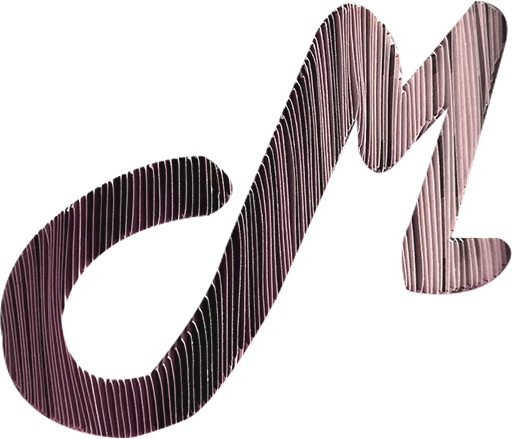 An M made from the folded pages of a book